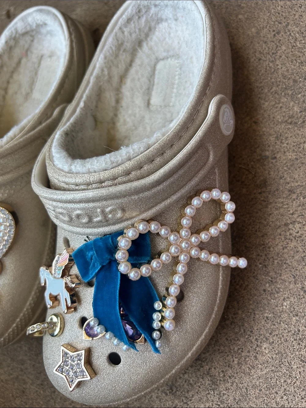 CROCS Kids Gold Glitter Clogs with Blue Velvet Charms